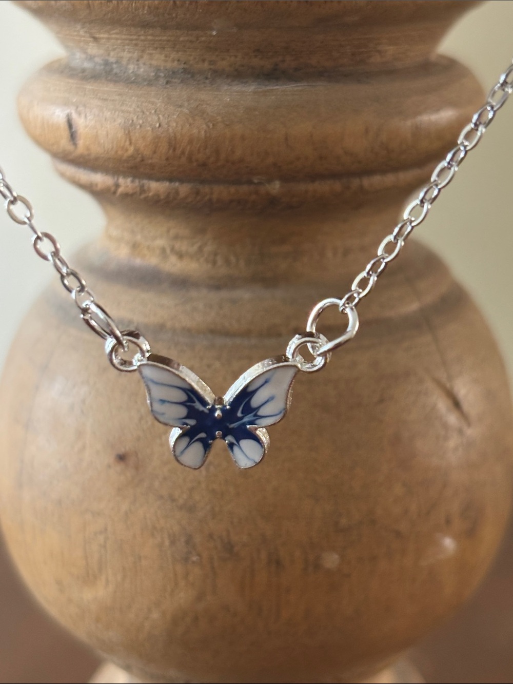 Silver tone Butterfly Pendant Necklace with Blue Enamel Accent